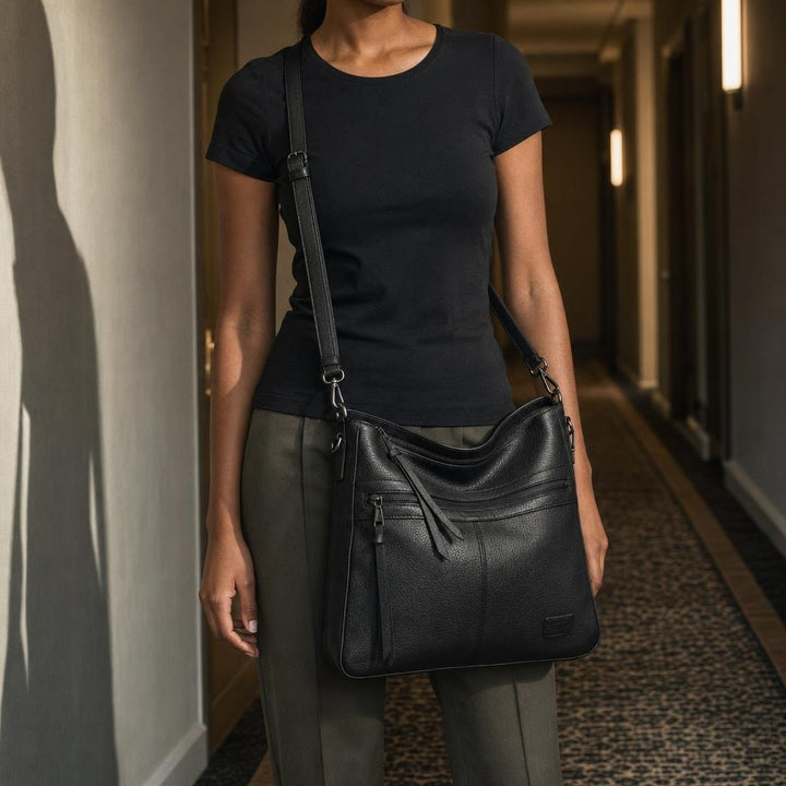 Women's Minimalist Sling Bag in Black, front view
